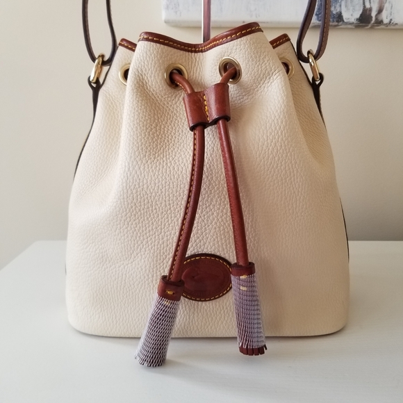Dooney & Bourke Handbags - Dooney & Bourke Pebbled All Weather Leather Drawstring Bucket Bag